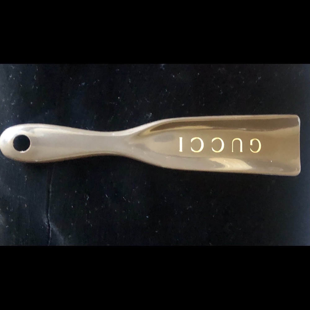 Gucci shoe horn. Brown. 7”